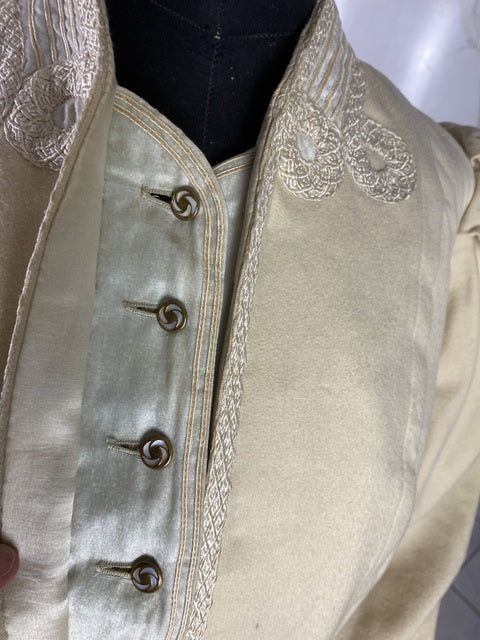 Antique fashion Edwardian coat — back view highlighting construction and wool fabric
