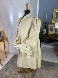 Antique fashion Edwardian coat — back view highlighting construction and wool fabric