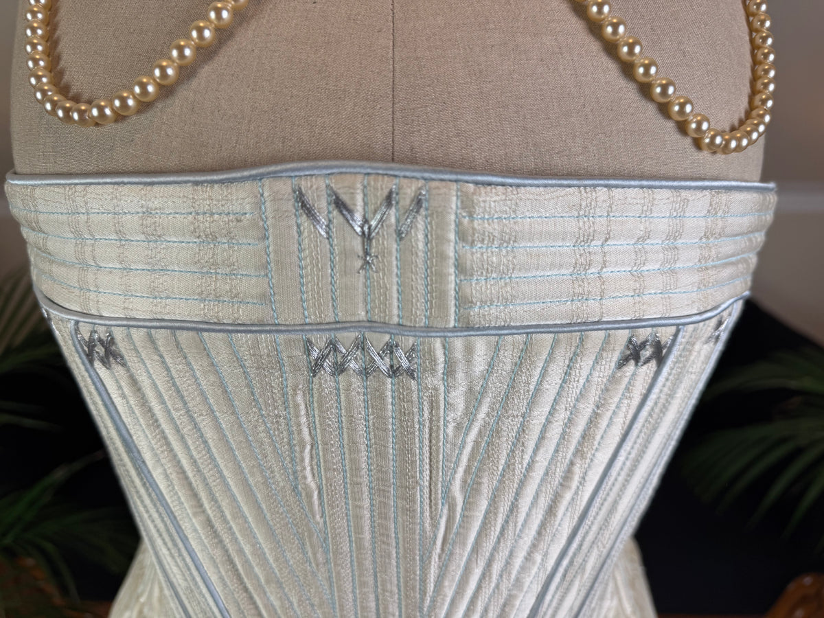 One‑piece vintage blue silk corset in 18th‑century style with hip gores and back lacing, English manufactory, excellent condition