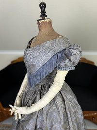 1845 Austrian Biedermeier evening dress in ivory silk with puffed sleeves and fitted bodice, antique gown