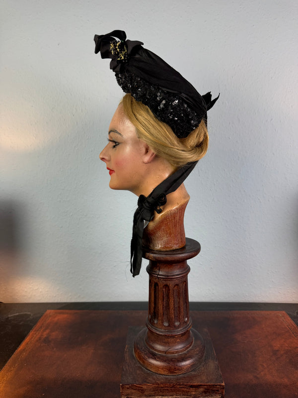 Victorian bonnet ca. 1880 with silk, sequins, fabric flowers, Paris label, chin bow, well preserved