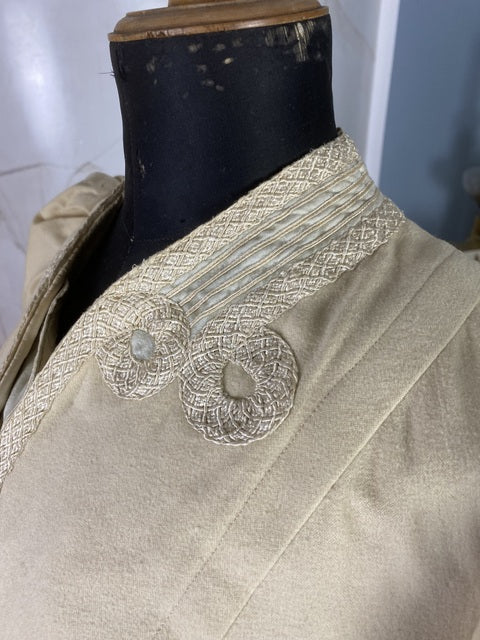 Antique fashion Edwardian coat — back view highlighting construction and wool fabric