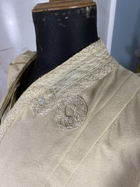 Antique fashion Edwardian coat — back view highlighting construction and wool fabric
