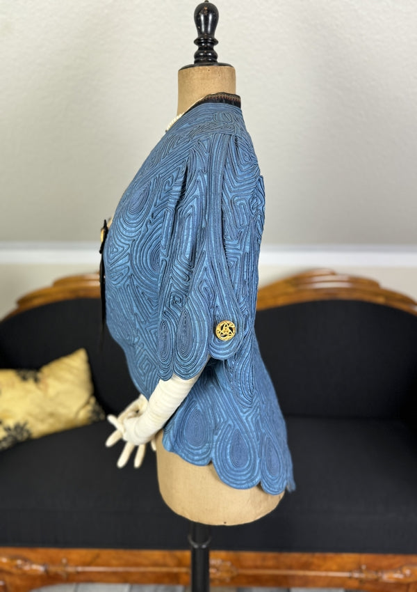 Art Nouveau buttons on early 20th century linen jacket