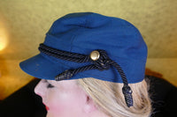 WEBER Grüne Woll-Sportmütze, ca. 1890