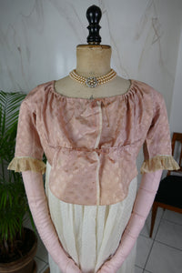 1795 French Directoire silk Spencer in cream tones with long sleeves and decorative front seams, antique garment