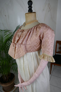 1795 French Directoire silk Spencer in cream tones with long sleeves and decorative front seams, antique garment