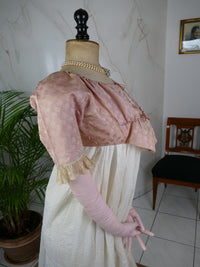 1795 French Directoire silk Spencer in cream tones with long sleeves and decorative front seams, antique garment