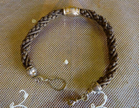Geflochtene Uhrenkette aus Haar, ca. 1870–1875