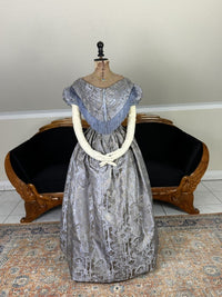 1845 Austrian Biedermeier evening dress in ivory silk with puffed sleeves and fitted bodice, antique gown