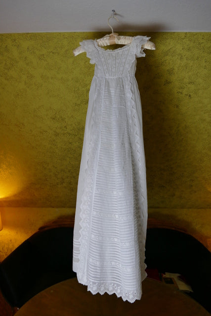 Edwardian christening gown ca. 1910 with white embroidery and pleated front