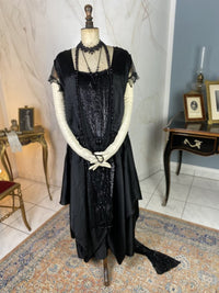 1918 black silk evening dress with sequins, cabochon stones and narrow train, antique transitional gown