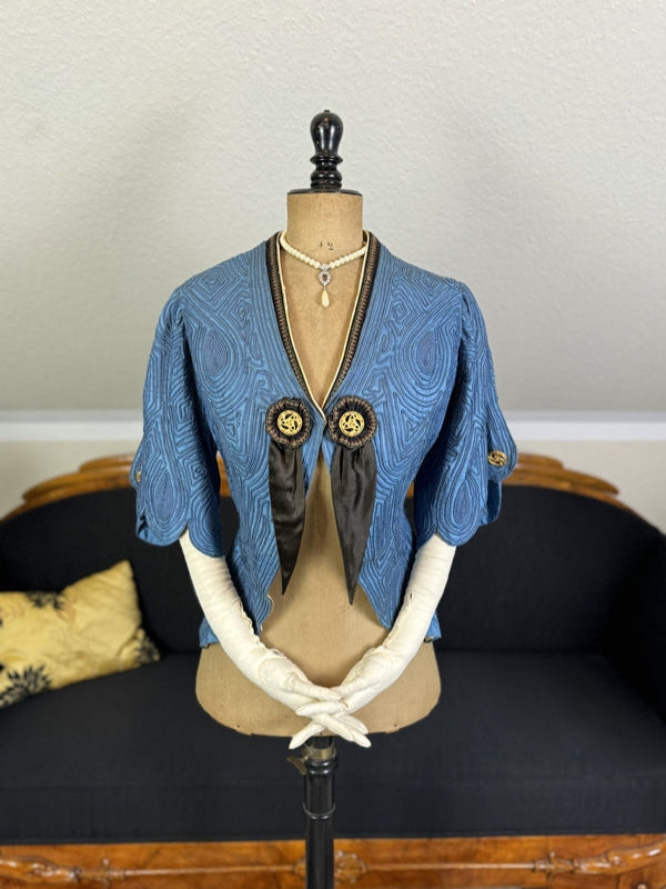 Antique blue linen jacket with soutache appliqués