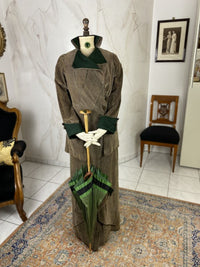1912 striped Edwardian walking dress in cotton with high waistline, long skirt and decorative buttons, antique gown